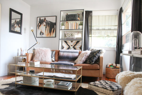 Take a tour of a small, but well styled living room with equestrian details