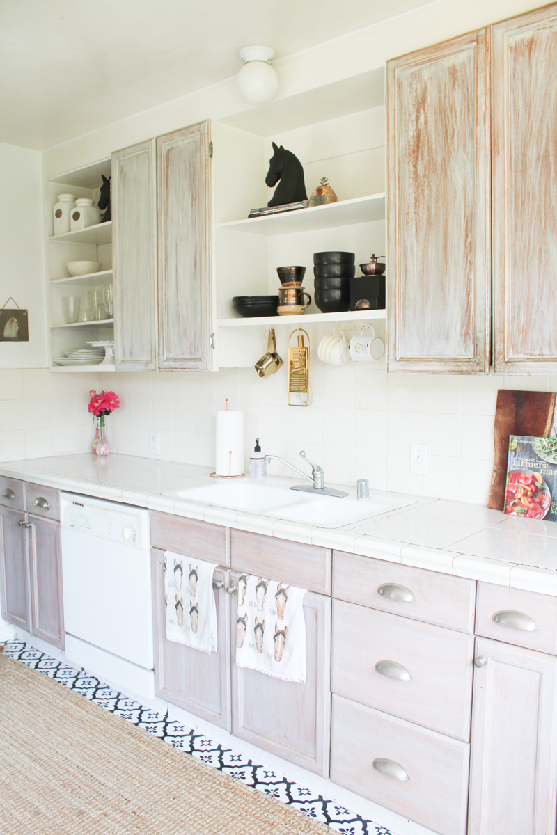 Light and bright kitchen with peel and stick floor tile