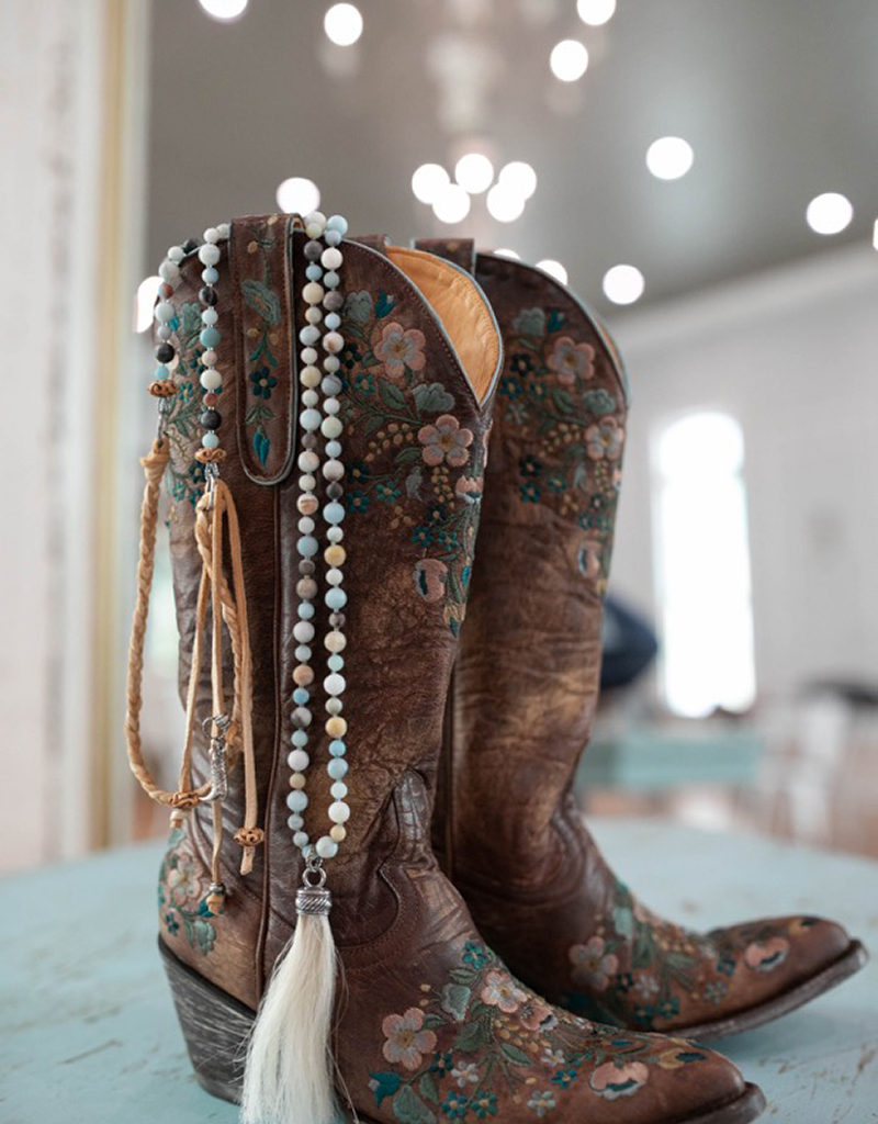 Cowboy boots with ida lou necklace