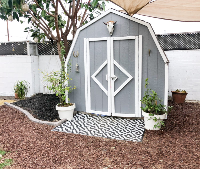 Beautiful grey and white paint job makes this barn look fresh