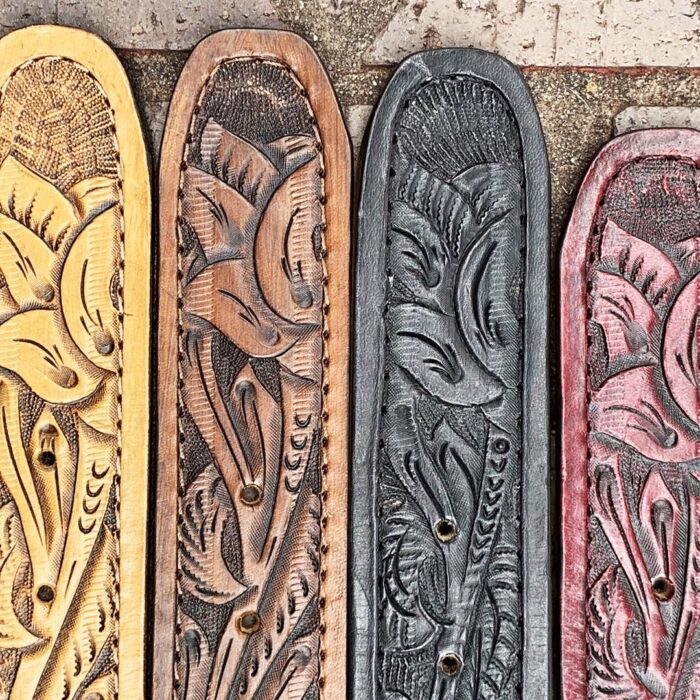 Tooled leather belts