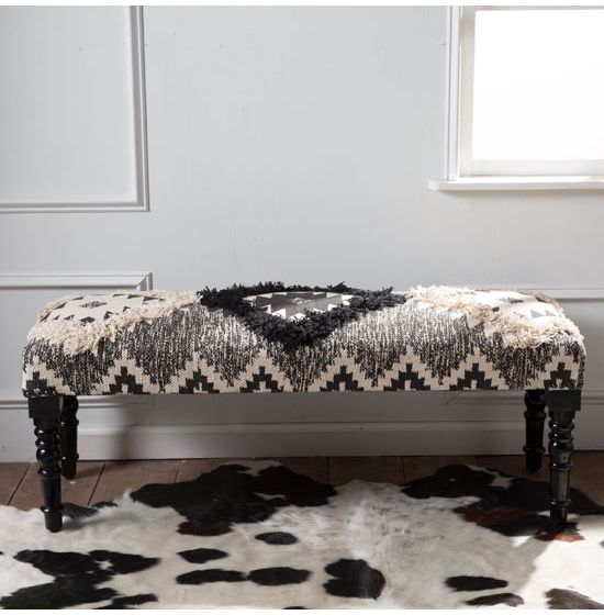 Black and white tufted bench