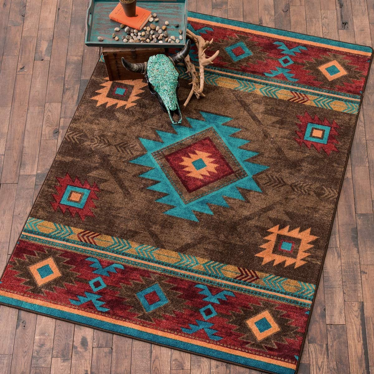 Turquoise and brown floor rug