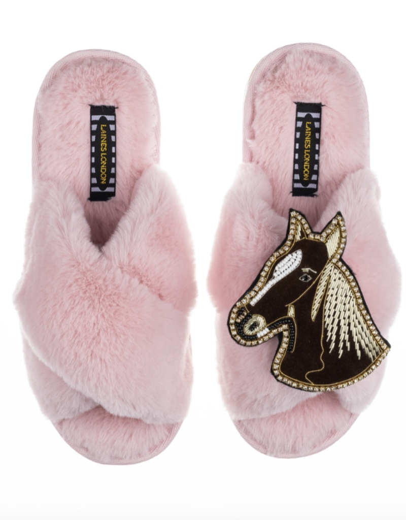 Pink slippers with horse brooch