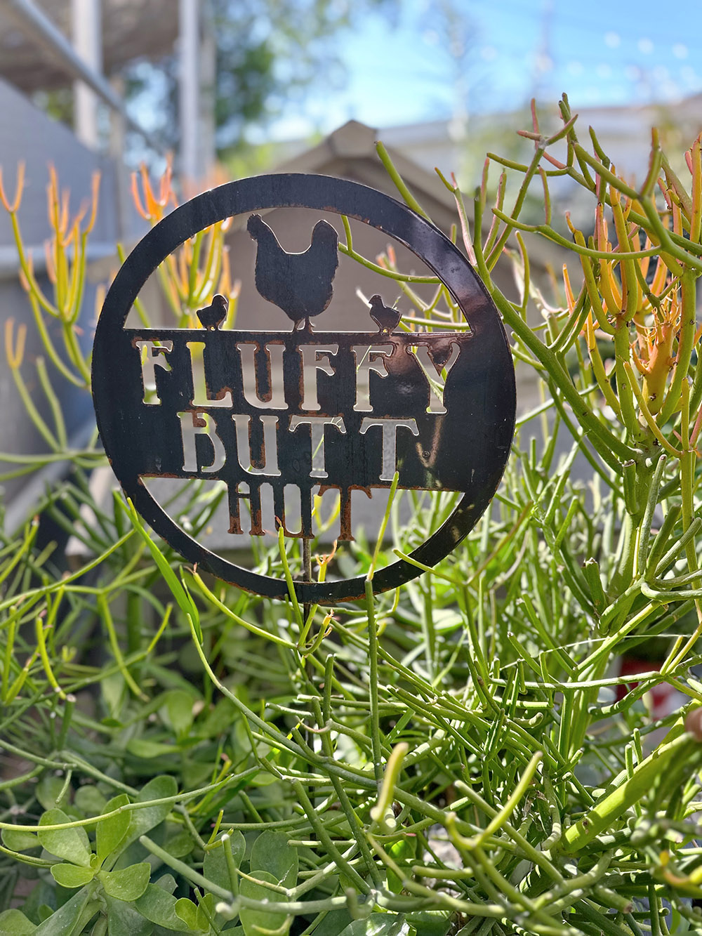 Fluffy butt hut chicken sign