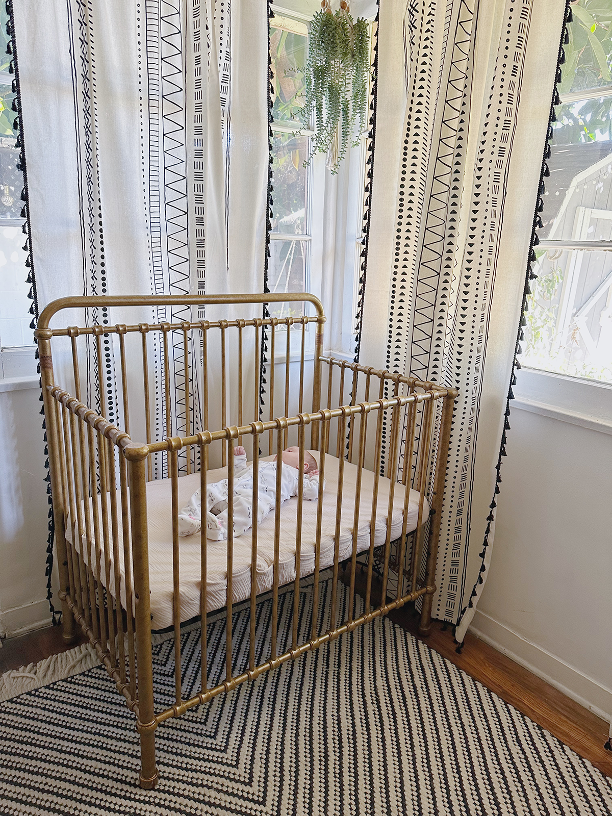 A mini crib that converts into a toddler bed