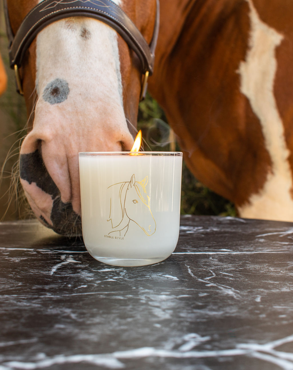 Horse head gold icon candle